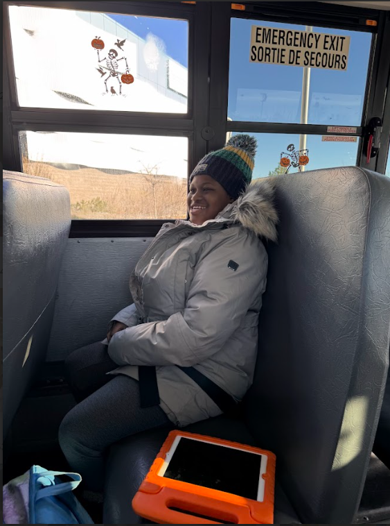 Student on bus heading to swim session